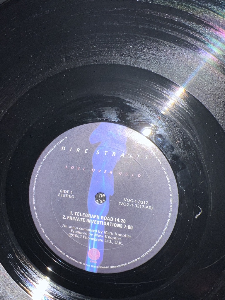 Dire Straits Love Over Gold side one label