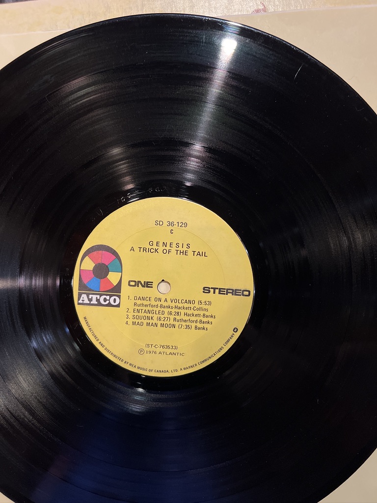 Genesis A Trick of the Tail side one label